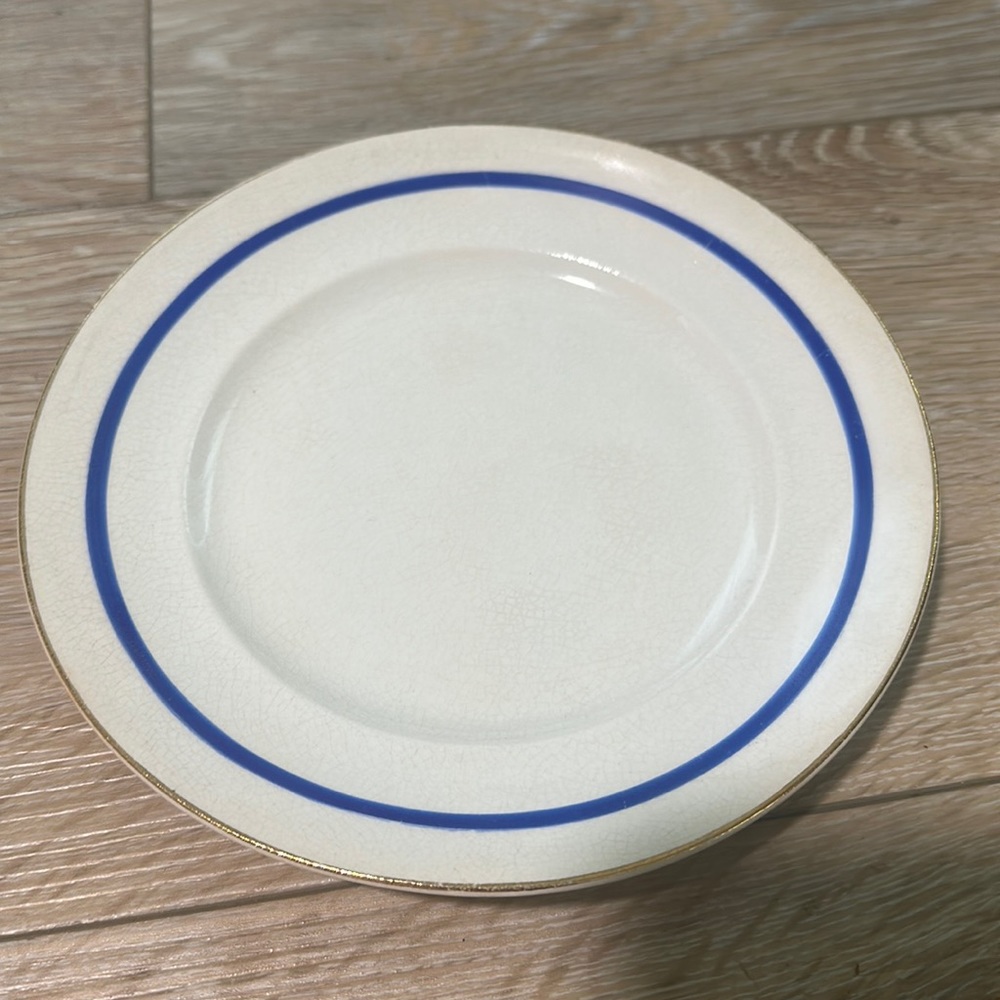 Puritan small plate.   Rare blue and gold.